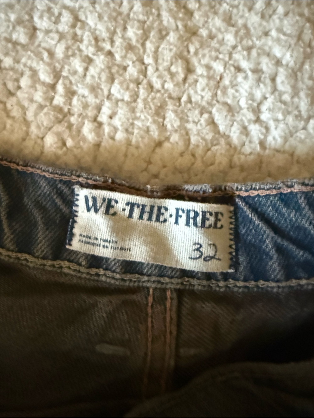 Free People Women’s Jeans in dark blue and tan stitching